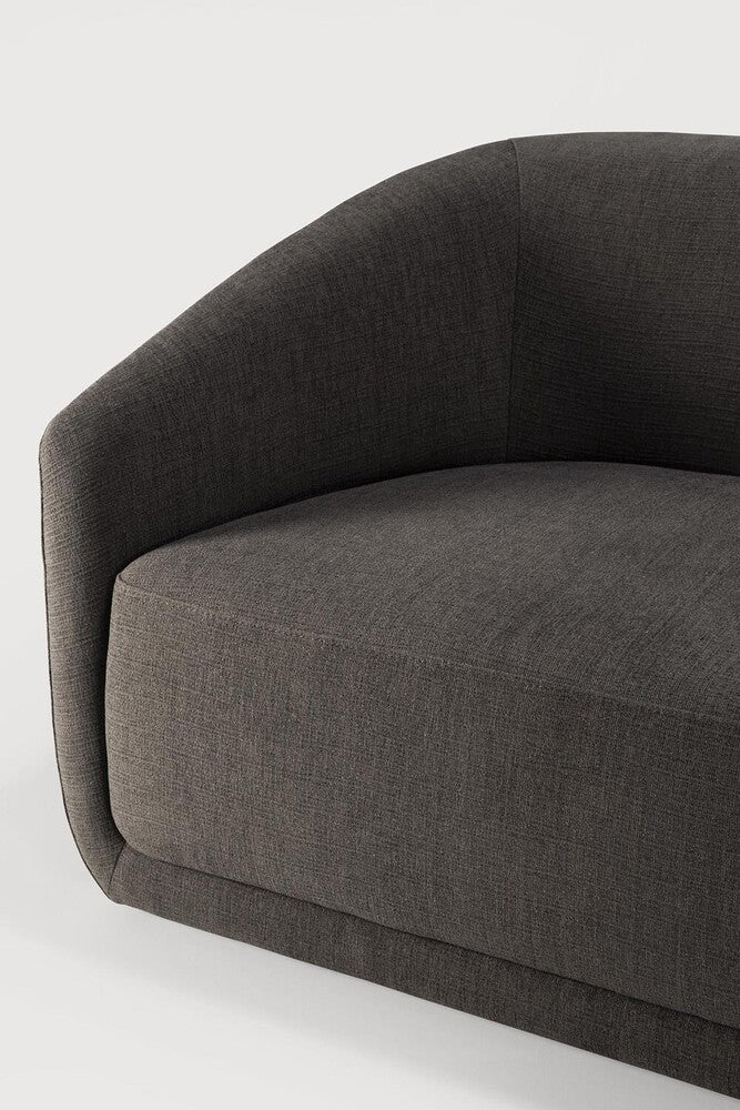 The Trapeze Three Seater Sofa by Jacques Deneef for Ethnicraft. Geometric, straight and clean lines: Trapeze is a statement of classic minimalism. Accumulate cushions to style it as you wish, like a blank canvas on which you can let your inspiration flow. This nonchalant lounge sofa will fit into any style, whether that be in an urban flat or a country homestead.