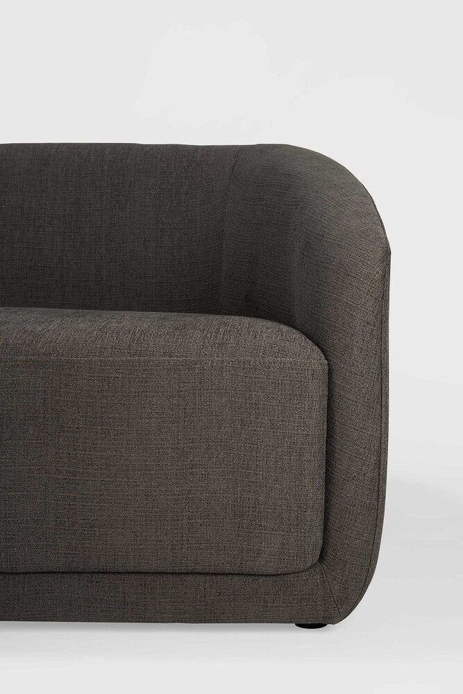 The Trapeze Three Seater Sofa by Jacques Deneef for Ethnicraft. Geometric, straight and clean lines: Trapeze is a statement of classic minimalism. Accumulate cushions to style it as you wish, like a blank canvas on which you can let your inspiration flow. This nonchalant lounge sofa will fit into any style, whether that be in an urban flat or a country homestead.