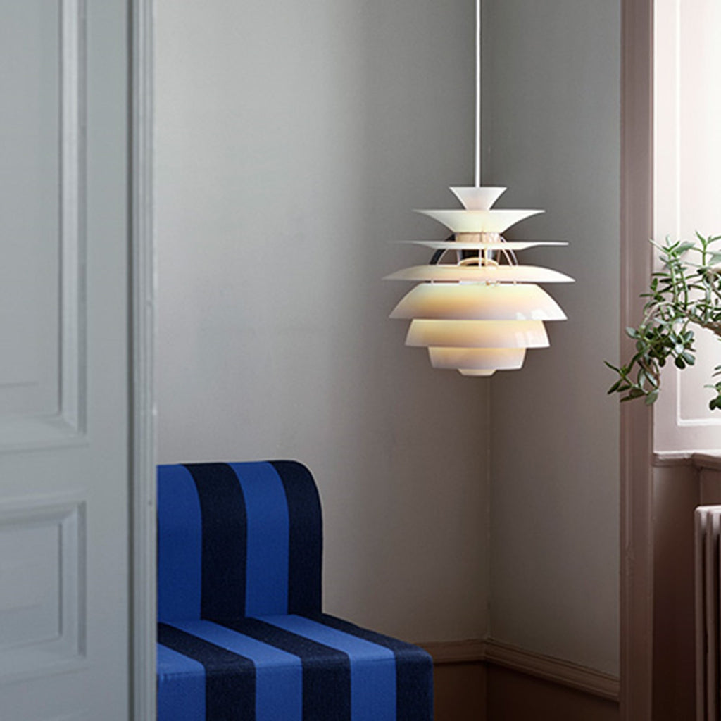 The PH Snowball fixture emits comfortable glare-free diffused light. Matte painted undersurfaces and glossy top surfaces result in an attractive reflection of the diffused light, creating uniform light distribution around the fixture. When the light is switched on, the top portion is illuminated while the bottom part remains dark.