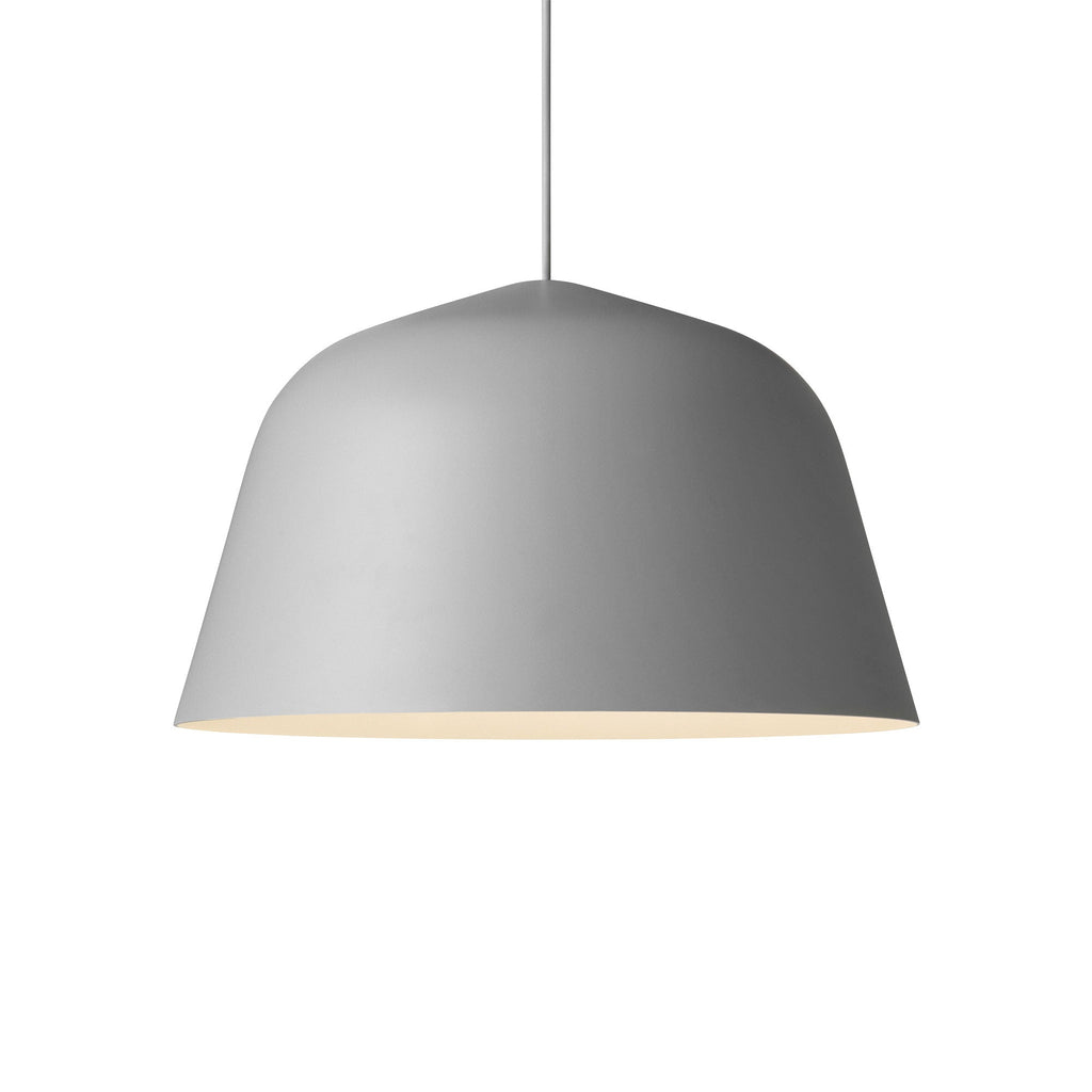 Embodying the values of Scandinavian design, the Ambit Pendant Lamp by Muuto is as timeless as it is contemporary. Made of hand-spun aluminum that has been hand-painted, the Ambit Pendant Lamp features clean lines and a white interior that heighten contrasts of its outside shade while enhancing the light emitted in any room of a home, office or commercial space. Use the design on its own or symmetric formations and vibrant clusters.