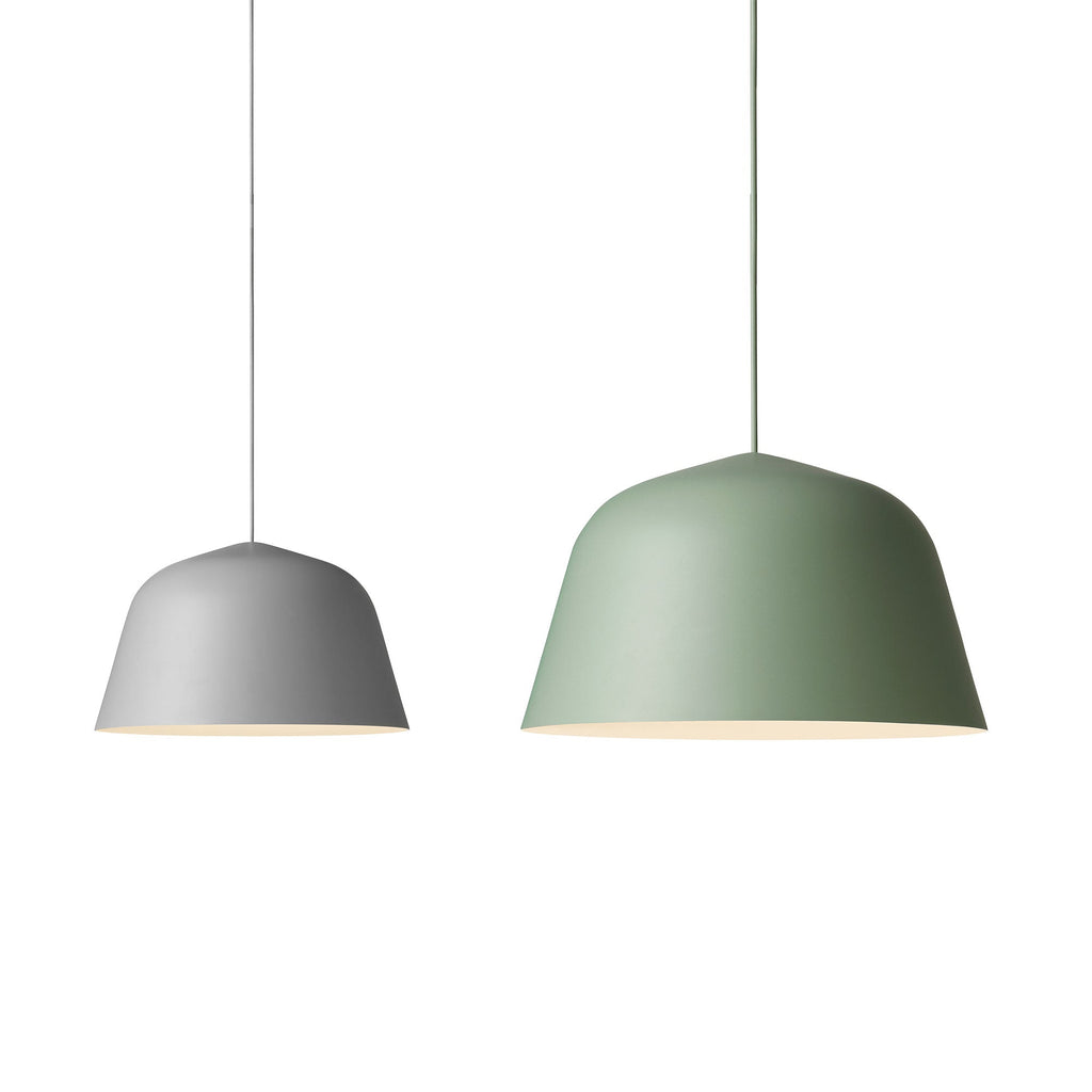 Embodying the values of Scandinavian design, the Ambit Pendant Lamp by Muuto is as timeless as it is contemporary. Made of hand-spun aluminum that has been hand-painted, the Ambit Pendant Lamp features clean lines and a white interior that heighten contrasts of its outside shade while enhancing the light emitted in any room of a home, office or commercial space. Use the design on its own or symmetric formations and vibrant clusters.