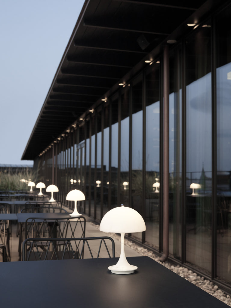 The versatile Panthella Portable by Louis Poulsen is the smallest edition of Verner Panton’s popular Table lamp from 1971. This scaled-down version of the original Panthella Table lamp can be used anywhere as it does not depend on a power supply.