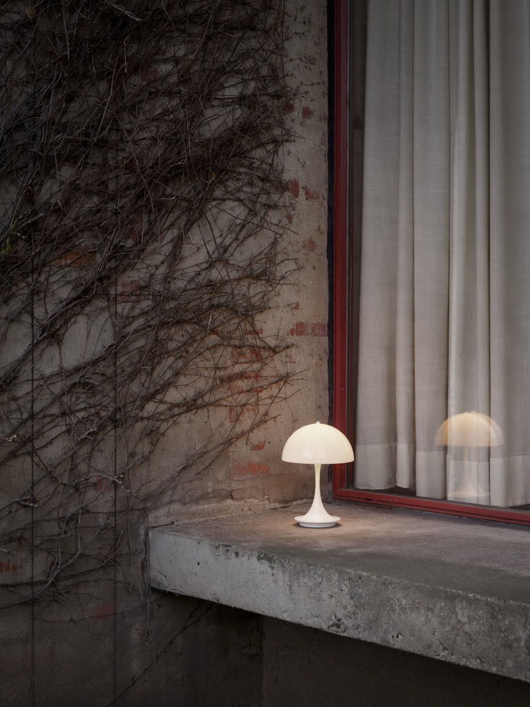 The versatile Panthella Portable by Louis Poulsen is the smallest edition of Verner Panton’s popular Table lamp from 1971. This scaled-down version of the original Panthella Table lamp can be used anywhere as it does not depend on a power supply.