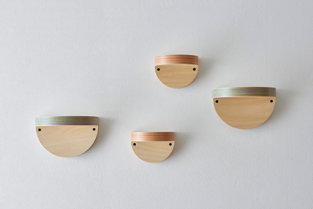 A wall shelf that can serve as a display space for your favorite books or accessories. It adds accent to your wall. Designed by Drill Design.