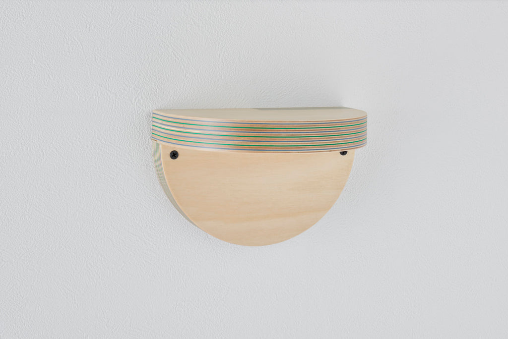 A wall shelf that can serve as a display space for your favorite books or accessories. It adds accent to your wall. Designed by Drill Design.