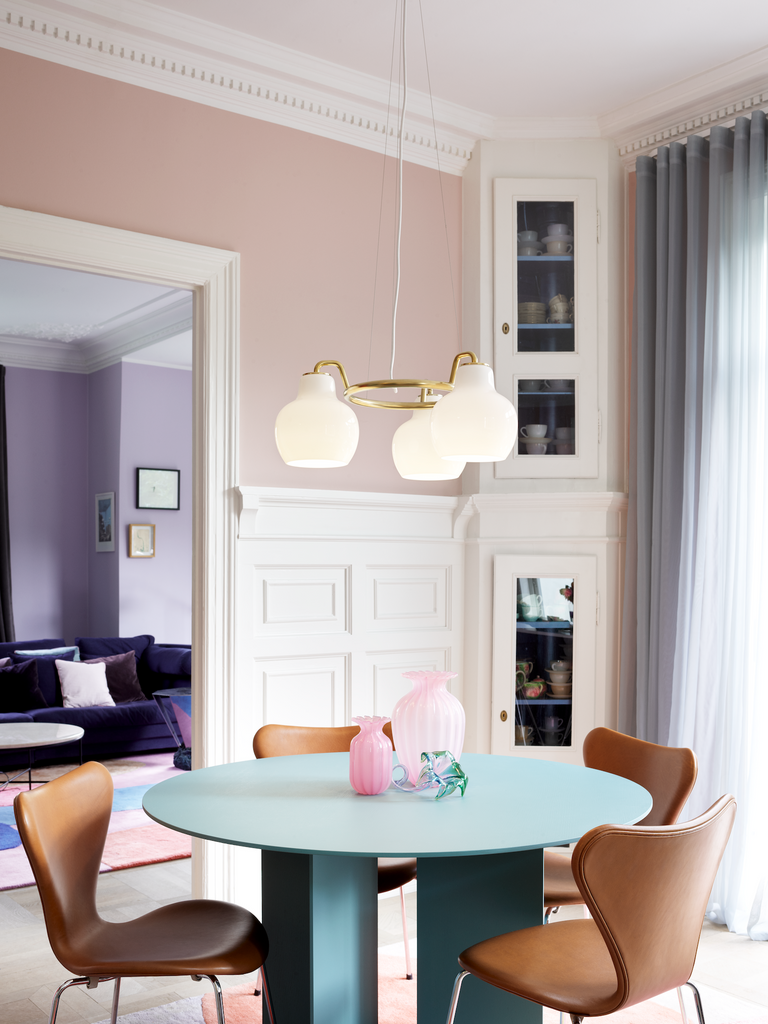 The VL Ring Crown pendant chandelier by Louis Poulsen emits light directed primarily downwards.‎ The opal glass provides a comfortable and uniform illumination of the area around the fixture.