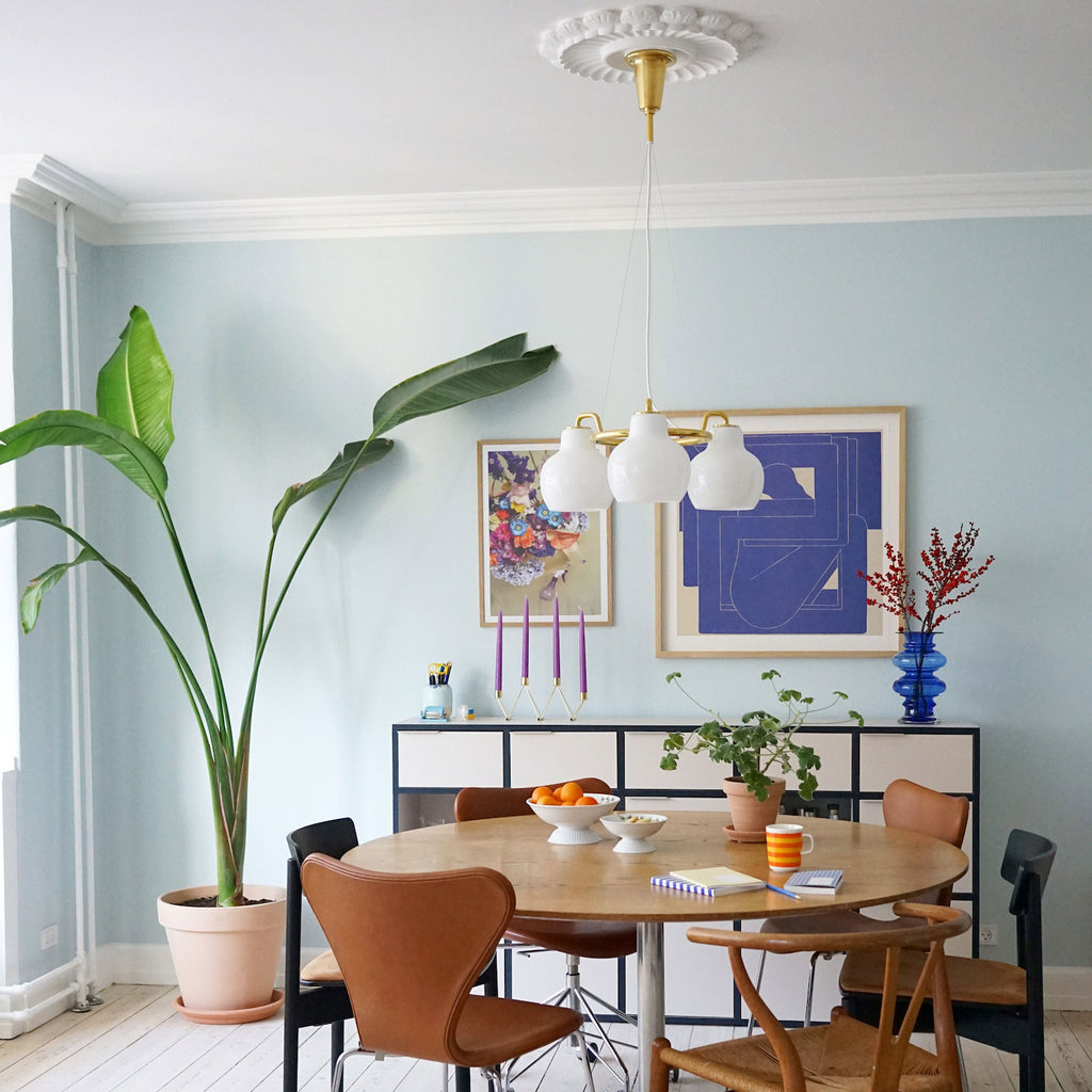 The VL Ring Crown pendant chandelier by Louis Poulsen emits light directed primarily downwards.‎ The opal glass provides a comfortable and uniform illumination of the area around the fixture.