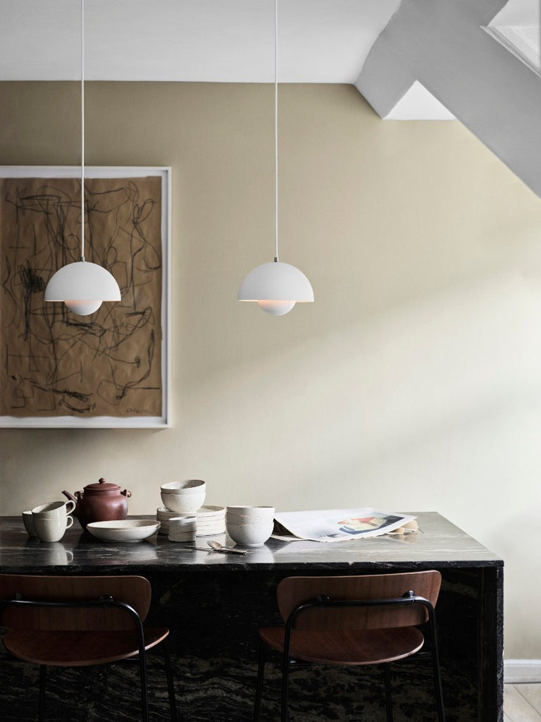 The Flowerpot VP1 Mini Pendant Light by Verner Panton became synonymous with the Flower Power movement from the late 60s. Reflecting a break from convention to embrace a more open, modern mentality that promoted peace and harmony. Such was the mindset of its designer, Verner Panton. One of the most forward-thinking talents of his time. The Flowerpot series consists of several different models, including three pendants and two table lamps - all in a wide range of colors.