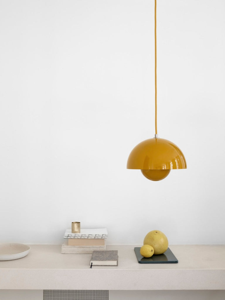 The Flowerpot VP1 Mini Pendant Light by Verner Panton became synonymous with the Flower Power movement from the late 60s. Reflecting a break from convention to embrace a more open, modern mentality that promoted peace and harmony. Such was the mindset of its designer, Verner Panton. One of the most forward-thinking talents of his time. The Flowerpot series consists of several different models, including three pendants and two table lamps - all in a wide range of colors.