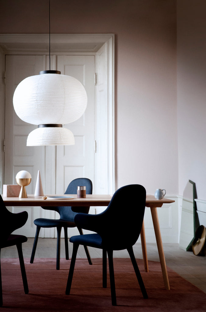  Here Hayon has dispensed with cultural formalities to create a series of lamps all in white. Hand crafted with rice paper merging various sizes and shapes together. The series is comprised of three different lantern versions and a table lamp in ivory white rice paper with black stained oak accents.
