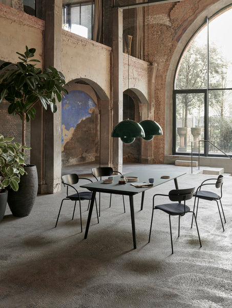 The Flowerpot VP2 Pendant Light by Verner Panton became synonymous with the Flower Power movement from the late 60s. Two are pictured here side by side in Dark Green.