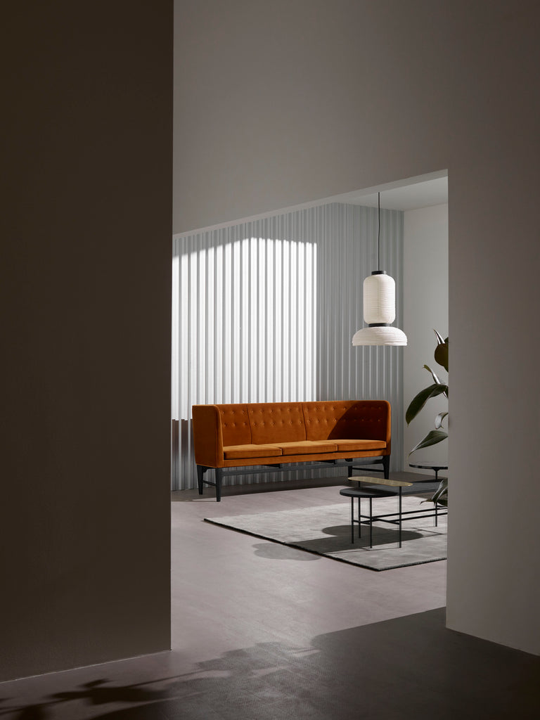 The JH3 Formakami Paper Lantern. Hand crafted with rice paper merging various sizes and shapes together. The series is comprised of three different lantern versions and a table lamp in ivory white rice paper with black stained oak accents.