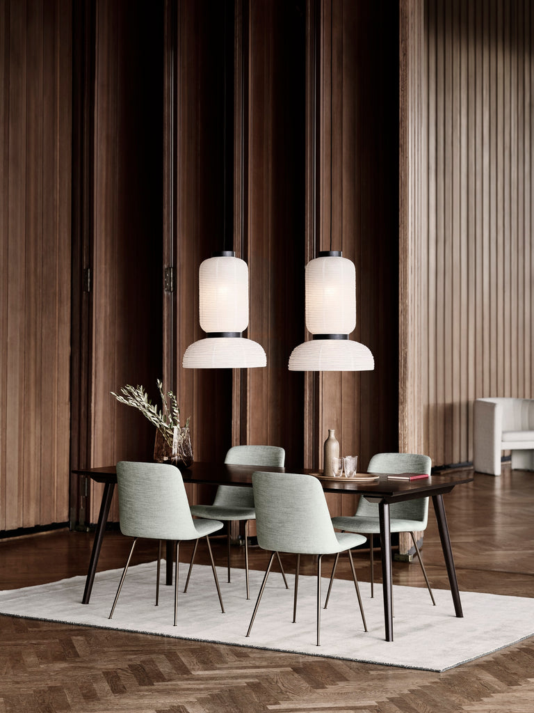 The JH3 Formakami Paper Lantern. Hand crafted with rice paper merging various sizes and shapes together. The series is comprised of three different lantern versions and a table lamp in ivory white rice paper with black stained oak accents.