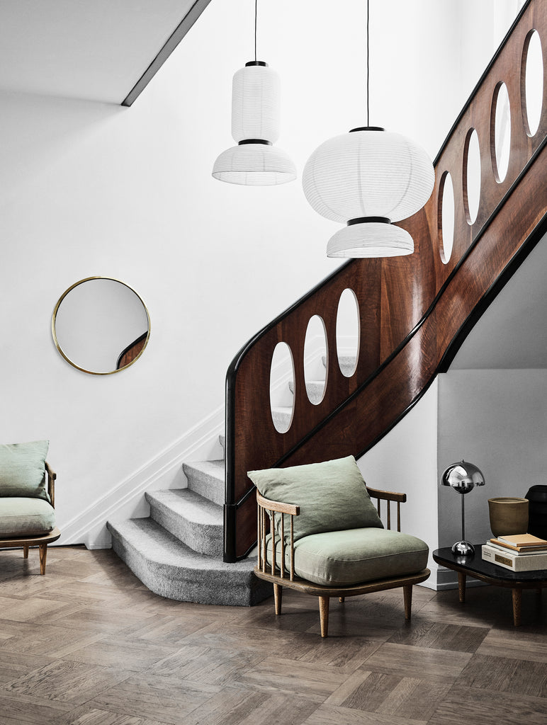 The JH3 Formakami Paper Lantern. Hand crafted with rice paper merging various sizes and shapes together. The series is comprised of three different lantern versions and a table lamp in ivory white rice paper with black stained oak accents.