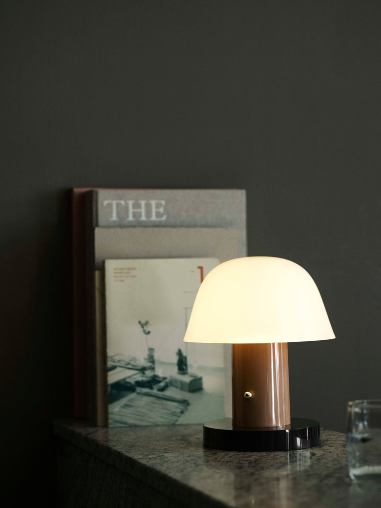 The Setago Portable Table Lamp by Jamie Hayon for &Tradition. ‘Seta’ the Spanish word for mushroom sets the tone for the diminutive, mushroom-like proportions of this quirky table lamp.
