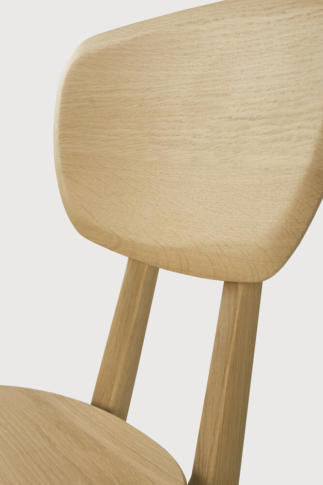 A nostalgic interpretation made with solid wood. The Pebble chair’s soft lines and airy elements provides not only seating comfort, but the familiar stylish shapes we have grown up loving. Designed by Alain Van Havre.