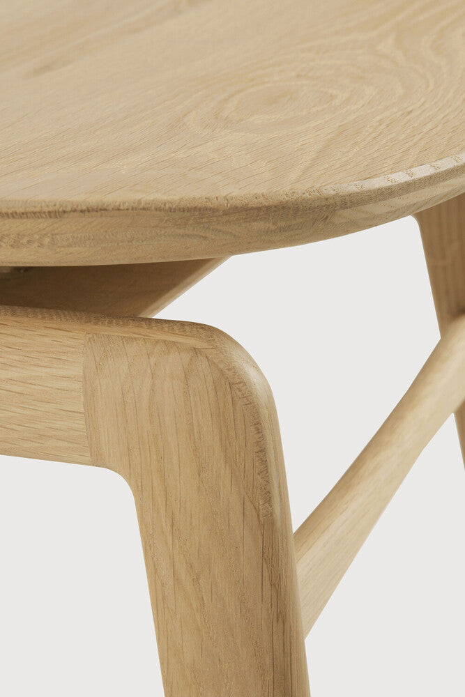 A nostalgic interpretation made with solid wood. The Pebble chair’s soft lines and airy elements provides not only seating comfort, but the familiar stylish shapes we have grown up loving. Designed by Alain Van Havre.