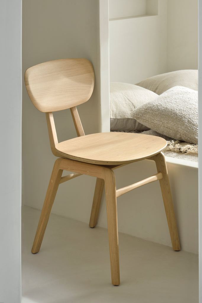 A nostalgic interpretation made with solid wood. The Pebble chair’s soft lines and airy elements provides not only seating comfort, but the familiar stylish shapes we have grown up loving. Designed by Alain Van Havre.