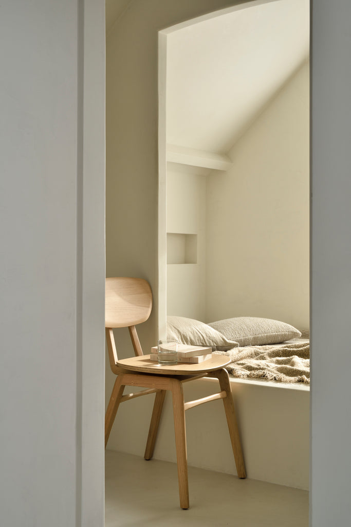 A nostalgic interpretation made with solid wood. The Pebble chair’s soft lines and airy elements provides not only seating comfort, but the familiar stylish shapes we have grown up loving. Designed by Alain Van Havre.