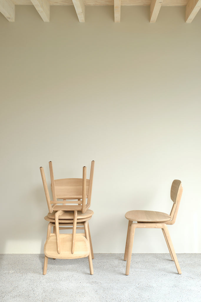 A nostalgic interpretation made with solid wood. The Pebble chair’s soft lines and airy elements provides not only seating comfort, but the familiar stylish shapes we have grown up loving. Designed by Alain Van Havre.