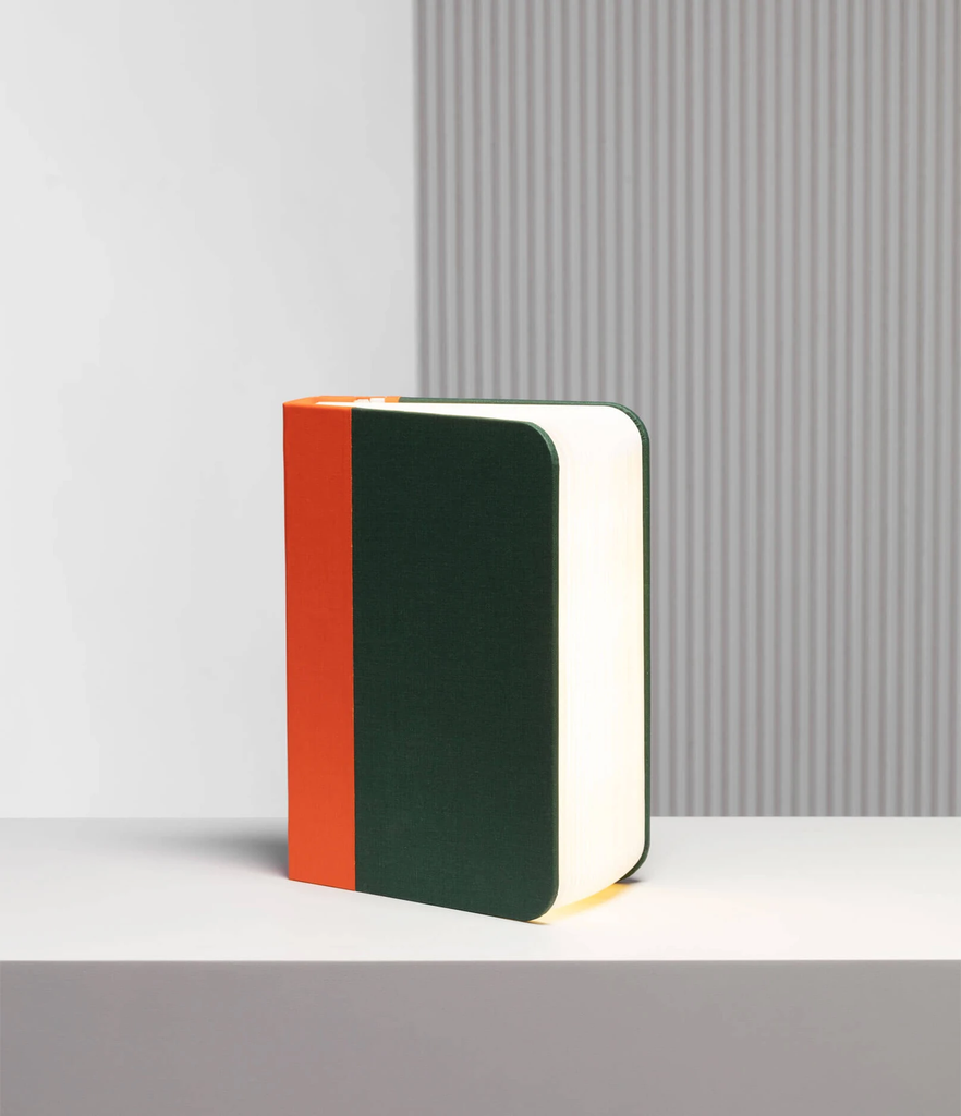 When closed, Lumio's Lito is a lamp concealed as a handsomely crafted, hard-cover book. Open it and it transforms into a sculptural light, radiating a warm glow.
