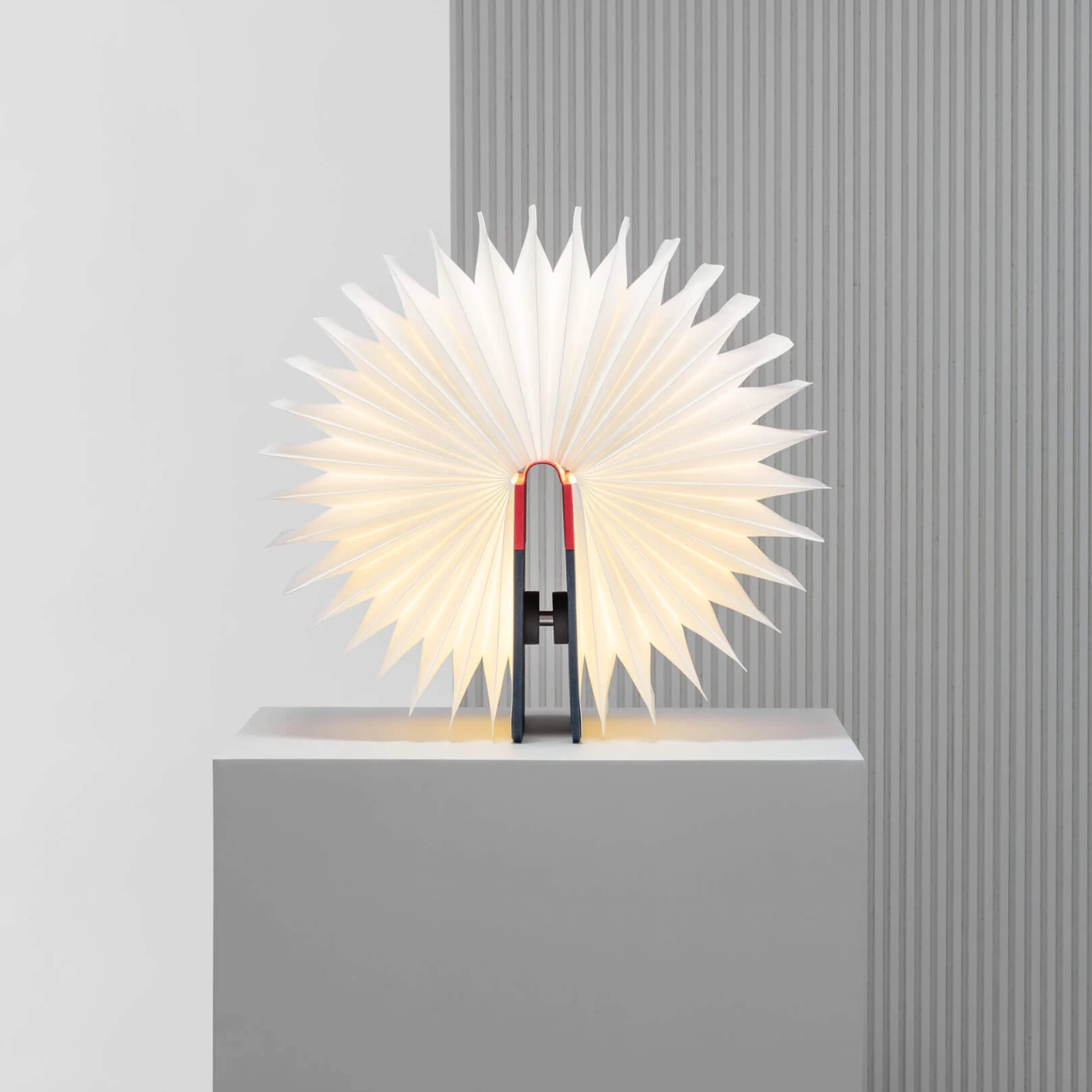 When closed, Lumio's Lito is a lamp concealed as a handsomely crafted, hard-cover book. Open it and it transforms into a sculptural light, radiating a warm glow.