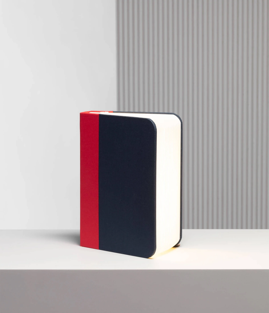 When closed, Lumio's Lito is a lamp concealed as a handsomely crafted, hard-cover book. Open it and it transforms into a sculptural light, radiating a warm glow.