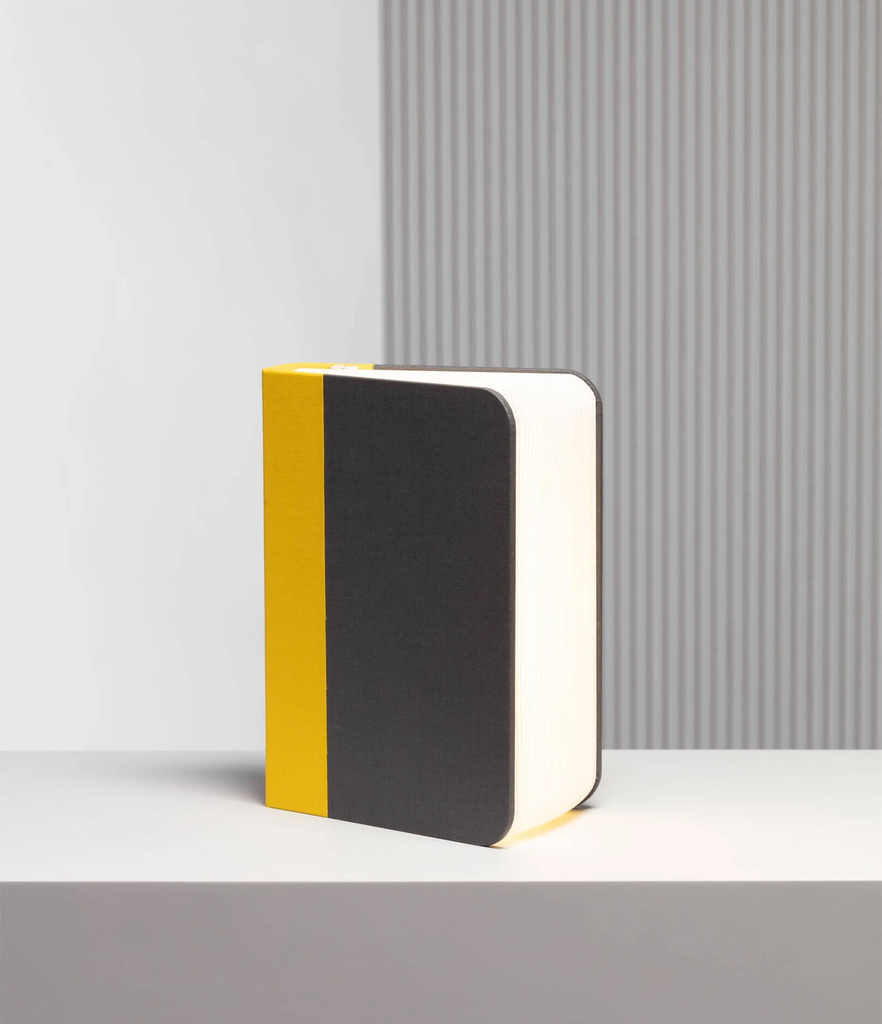 When closed, Lumio's Lito is a lamp concealed as a handsomely crafted, hard-cover book. Open it and it transforms into a sculptural light, radiating a warm glow.