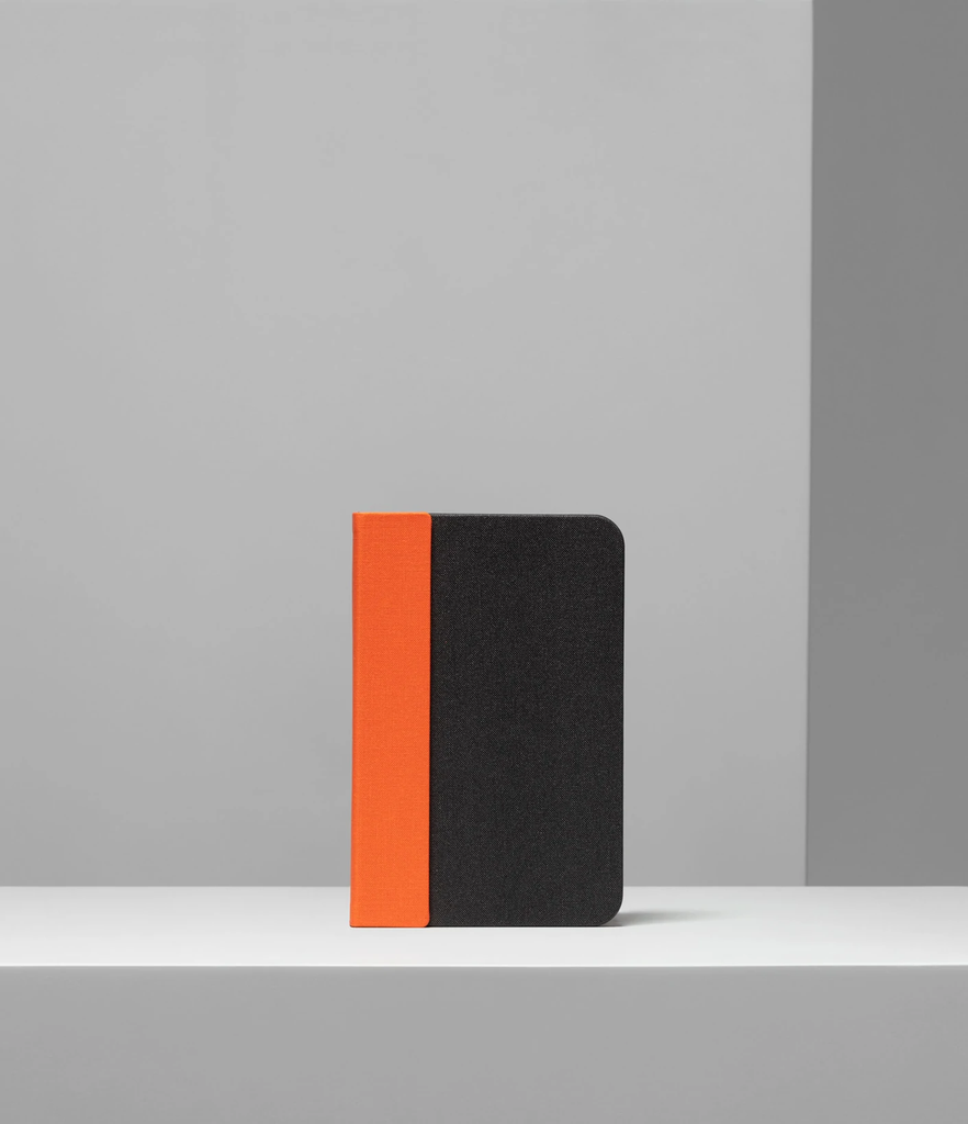 Lito mini is a compact, multi-functional portable lamp and battery pack for mobile phones that conceals itself in the form of a hard-cover book.