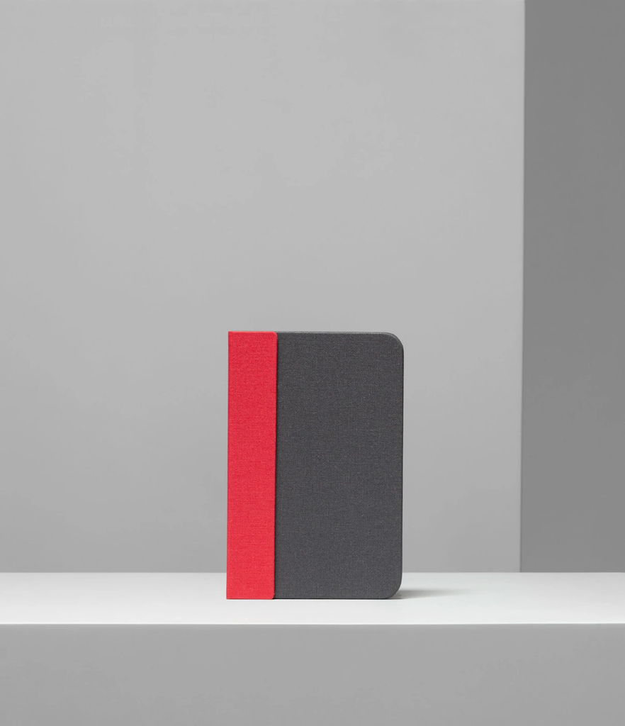Lito mini is a compact, multi-functional portable lamp and battery pack for mobile phones that conceals itself in the form of a hard-cover book.