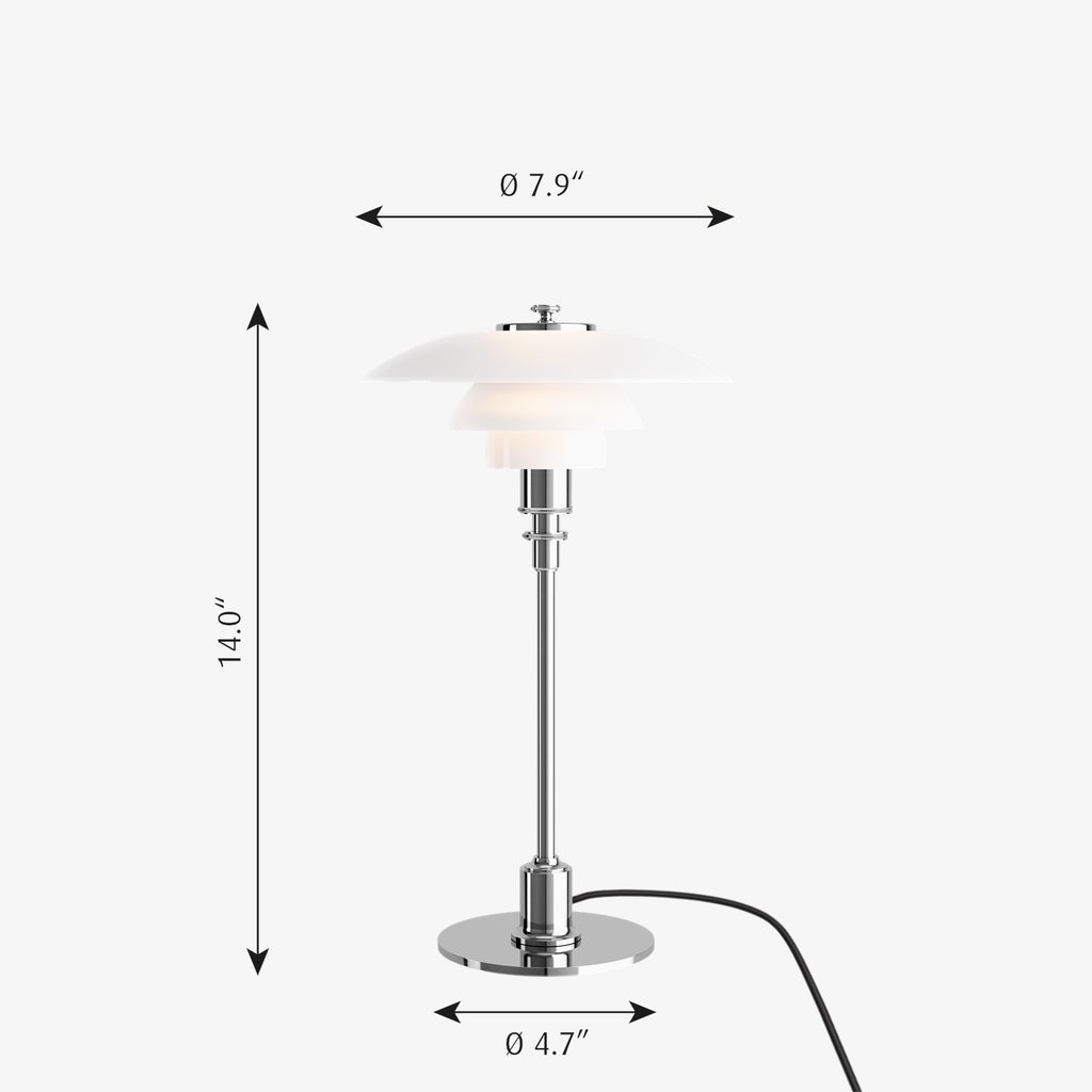The PH 2/1 Table Light by Paul Henningsen for Louis Poulsen features a triple-layer hand blown glass shade that rests on a beautiful, lightly brushed brass frame, which references the original PH Table Lamp from 1927. Its design evokes timeless elegance with its use of classic materials. Complimenting environments both simple and eclectic, the PH 2/1 boasts a small profile making the lamp endlessly adaptable anywhere within the home, like on a windowsill or small table. 
