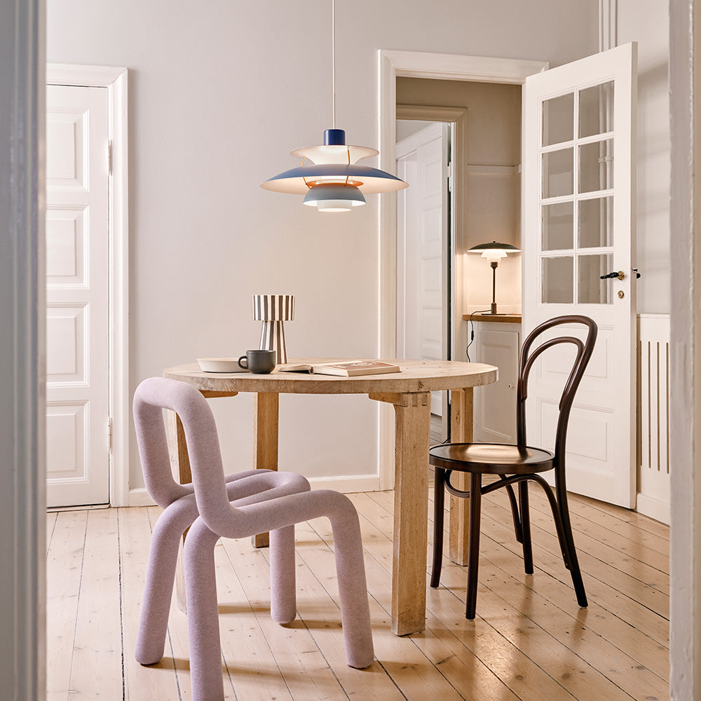 The PH 5 Hues of Blue Pendant Light with Bold Chair by Big Game Design