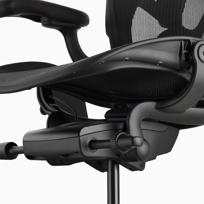 The Aeron office chair by Herman Miller revolutionized office seating with its defining design qualities: the pioneering Pellicle suspension material and its patented PostureFit SL back support, which affords the ideal sit — chest open, shoulders back, pelvis tilted slightly forward. 