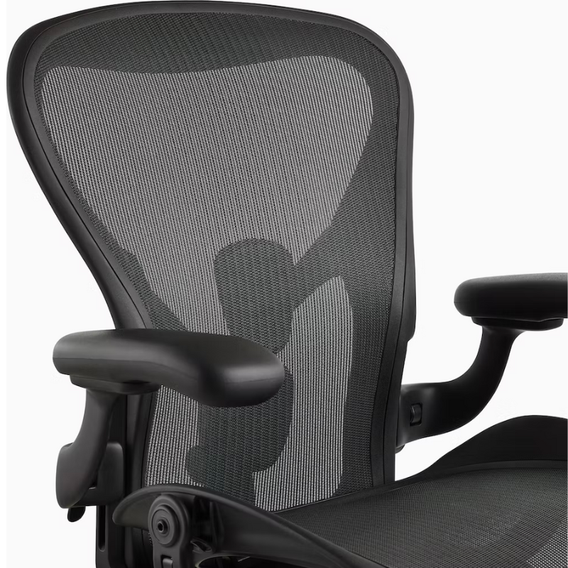 The Aeron office chair by Herman Miller revolutionized office seating with its defining design qualities: the pioneering Pellicle suspension material and its patented PostureFit SL back support, which affords the ideal sit — chest open, shoulders back, pelvis tilted slightly forward. 