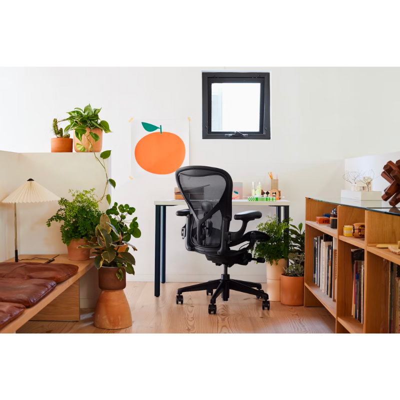 The Aeron office chair by Herman Miller revolutionized office seating with its defining design qualities: the pioneering Pellicle suspension material and its patented PostureFit SL back support, which affords the ideal sit — chest open, shoulders back, pelvis tilted slightly forward. 