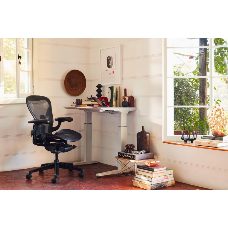 The Aeron office chair by Herman Miller revolutionized office seating with its defining design qualities: the pioneering Pellicle suspension material and its patented PostureFit SL back support, which affords the ideal sit — chest open, shoulders back, pelvis tilted slightly forward. 