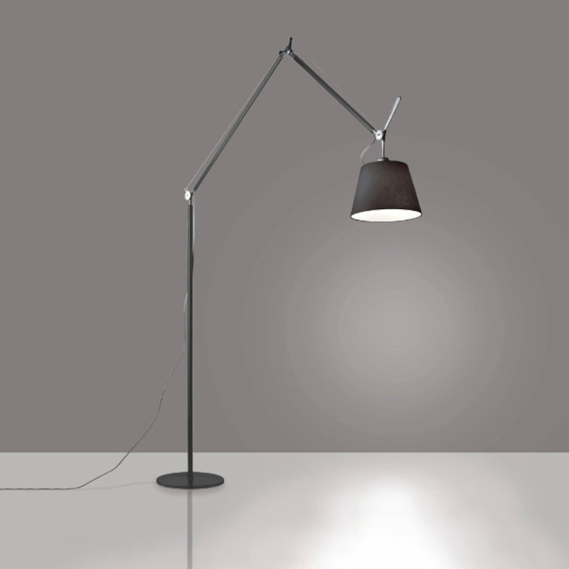 An extension to the iconic Tolomeo family, Tolomeo Mega features the same arm balancing system as the Tolomeo table lamp combined with a selection of parchment or fabric shades, creating its own sub-family.