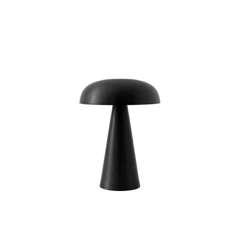 Match lighting to mood with Como SC53, a portable table lamp from Space Copenhagen. Crafted from anodized aluminum, Como’s sturdy base tapers up towards a soft curved, mushroom-shaped shade. This battery-powered lamp can operate for eleven hours at the highest setting, with an extra battery option that allows additional operating. It is easily recharged with a magnetic USB cable or a charging tray.