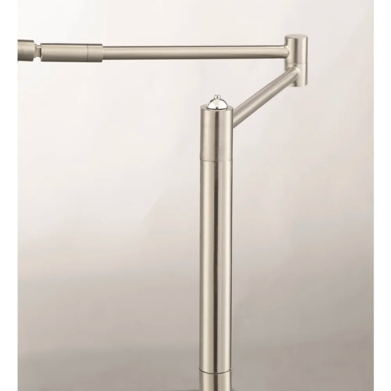 The Dessau Turbo floor lamp is a dimmable task lamp with a swing arm and adjustable head - which allows you to direct light in nearly any direction.