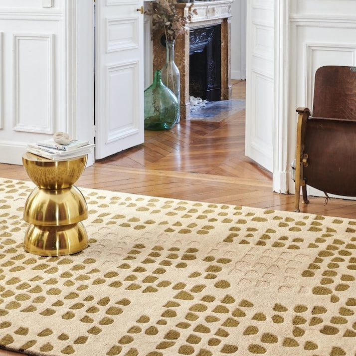 The Galets area rug by Toulemonde Bochart echoes the thought and nature of the Zen garden, the natural balance of fullness and emptiness takes place. A pebble path invites us to take a peaceful walk. The colors are mineral and the textures of wool play with their variations.