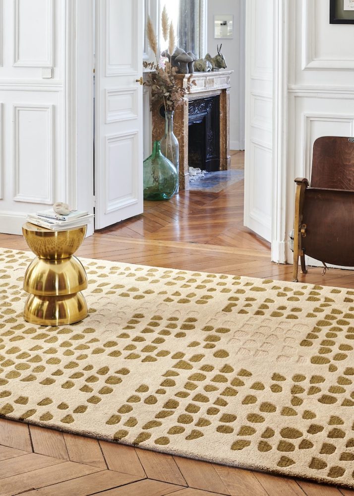 The Galets area rug by Toulemonde Bochart echoes the thought and nature of the Zen garden, the natural balance of fullness and emptiness takes place. A pebble path invites us to take a peaceful walk. The colors are mineral and the textures of wool play with their variations.