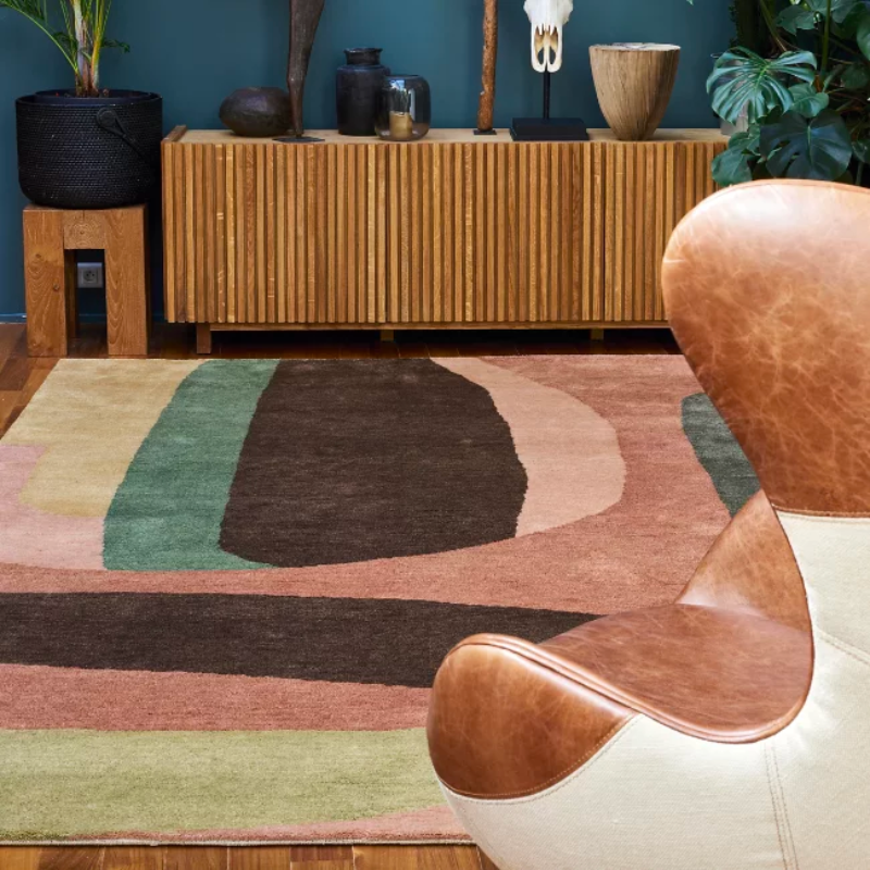 The mesmerizing Loft Area Rug by Toulemonde Bochart adds an abstract touch to your home. This ornate, artistic work is composed of 100% wool for a feeling of unrivaled comfort. With sensuality as a point of inspiration for this colorful rug, your space will surely take on an inviting aura. The rug’s vibe is purposefully vintage, and the wool that forms this rug has been worked in the hand-knotted tradition of rugmaking that demonstrates excellent craftsmanship.