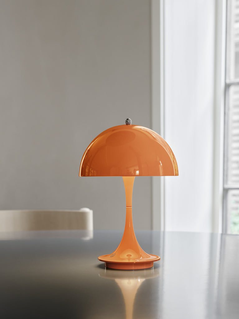 The versatile Panthella Portable by Louis Poulsen is the smallest edition of Verner Panton’s popular Table lamp from 1971. This scaled-down version of the original Panthella Table lamp can be used anywhere as it does not depend on a power supply.