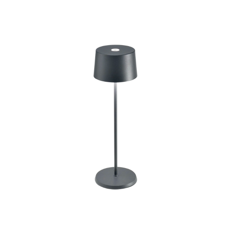 Accent your home with the simple, yet beautiful form of the Olivia Rechargeable LED Table Lamp from Ai Lati Lights. Composed throughout of die-cast aluminum, this small and expressive piece unites the space around it with a hefty layer of light. 
