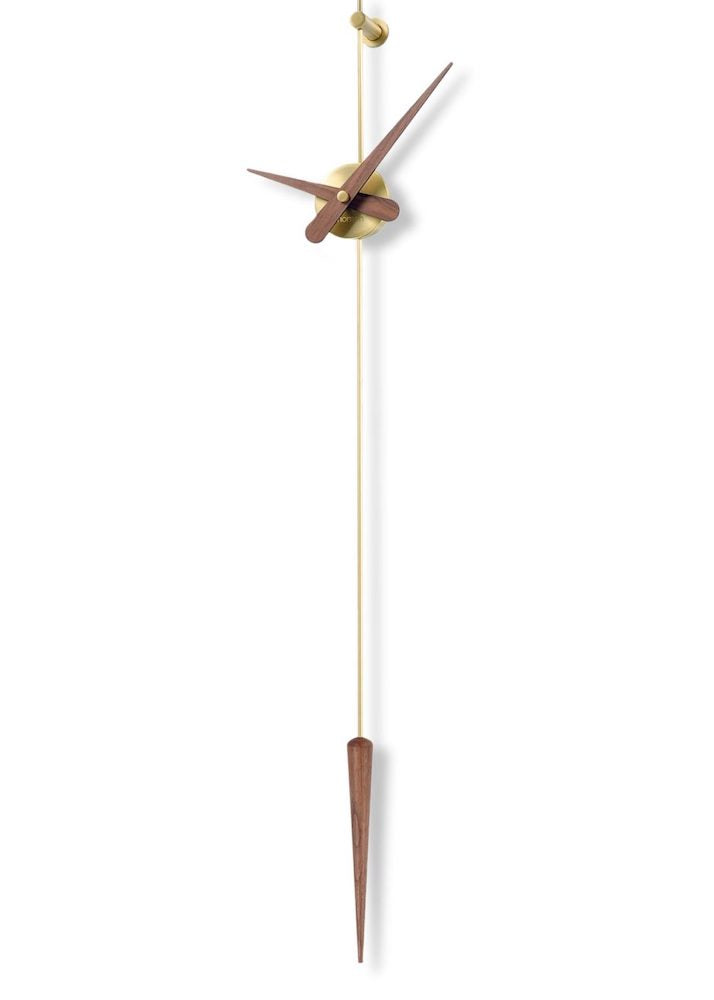 The Punto y Coma Clock has a great personality and a contemporary design, which reinterprets the classic pendulum clock.