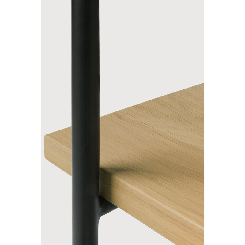 The Rise Side Table by Ethnicraft is inspired by minimalistic residential architecture, a light rectangular design is formed by the warmth of oak and metal.
