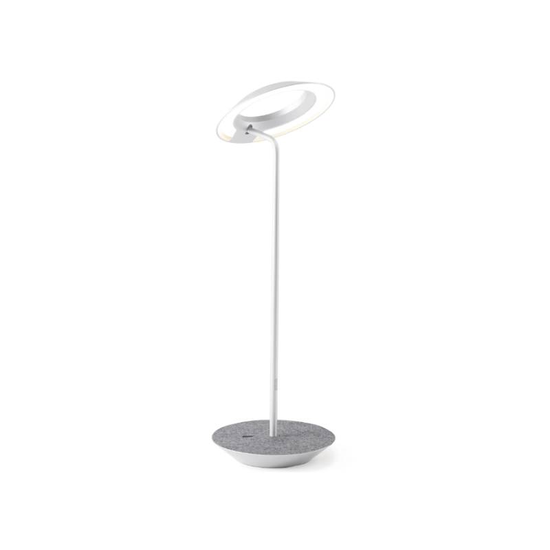 A simultaneously retro and modern desk lamp that combines elegance and inviting warmth. The Royyo Desk Lamp by Koncept will bring whimsy and charm to your desk, as well as super useful and energy-efficient LED illumination. Inventive simplicity is the value that holds together each piece of the desk lamp’s aesthetic, with a somewhat conical shade held at a distinct angle by a thin Aluminum stem. This is contrasted neatly by a distinctively shaped base.