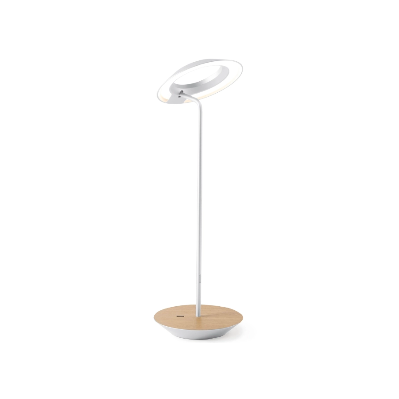A simultaneously retro and modern desk lamp that combines elegance and inviting warmth. The Royyo Desk Lamp by Koncept will bring whimsy and charm to your desk, as well as super useful and energy-efficient LED illumination. Inventive simplicity is the value that holds together each piece of the desk lamp’s aesthetic, with a somewhat conical shade held at a distinct angle by a thin Aluminum stem. This is contrasted neatly by a distinctively shaped base.
