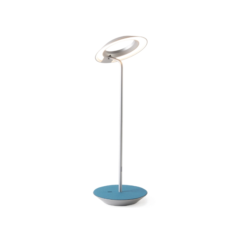A simultaneously retro and modern desk lamp that combines elegance and inviting warmth. The Royyo Desk Lamp by Koncept will bring whimsy and charm to your desk, as well as super useful and energy-efficient LED illumination. Inventive simplicity is the value that holds together each piece of the desk lamp’s aesthetic, with a somewhat conical shade held at a distinct angle by a thin Aluminum stem. This is contrasted neatly by a distinctively shaped base.