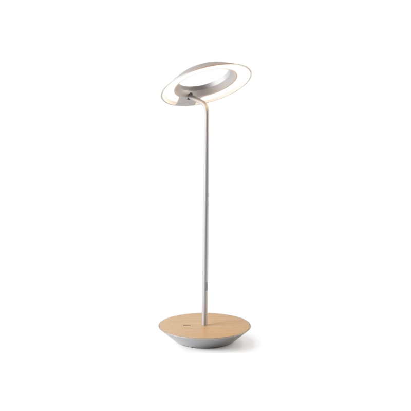 A simultaneously retro and modern desk lamp that combines elegance and inviting warmth. The Royyo Desk Lamp by Koncept will bring whimsy and charm to your desk, as well as super useful and energy-efficient LED illumination. Inventive simplicity is the value that holds together each piece of the desk lamp’s aesthetic, with a somewhat conical shade held at a distinct angle by a thin Aluminum stem. This is contrasted neatly by a distinctively shaped base.